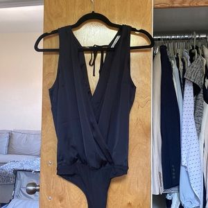 Abercrombie bodysuit size small. Never worn